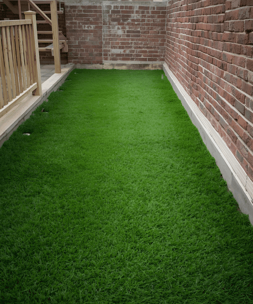 Artificial grass laid in a back garden